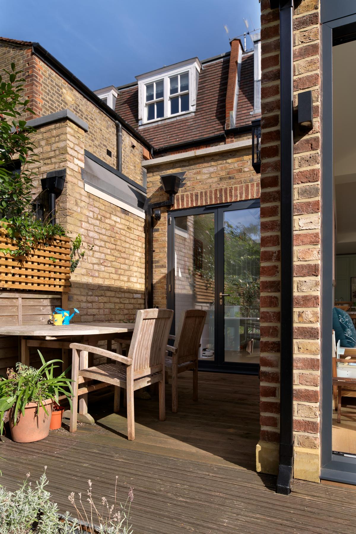 The deck between the two parts of the new work.
