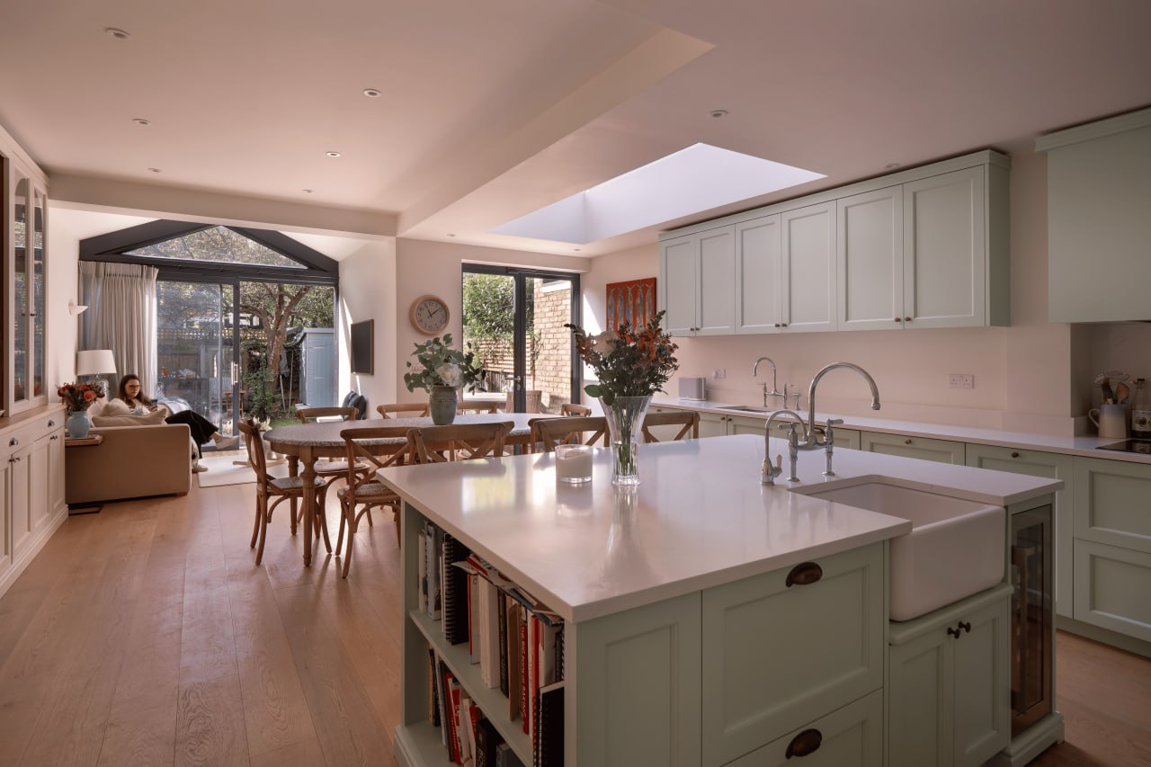 Inside: the island, with the gable glazing at the far end.