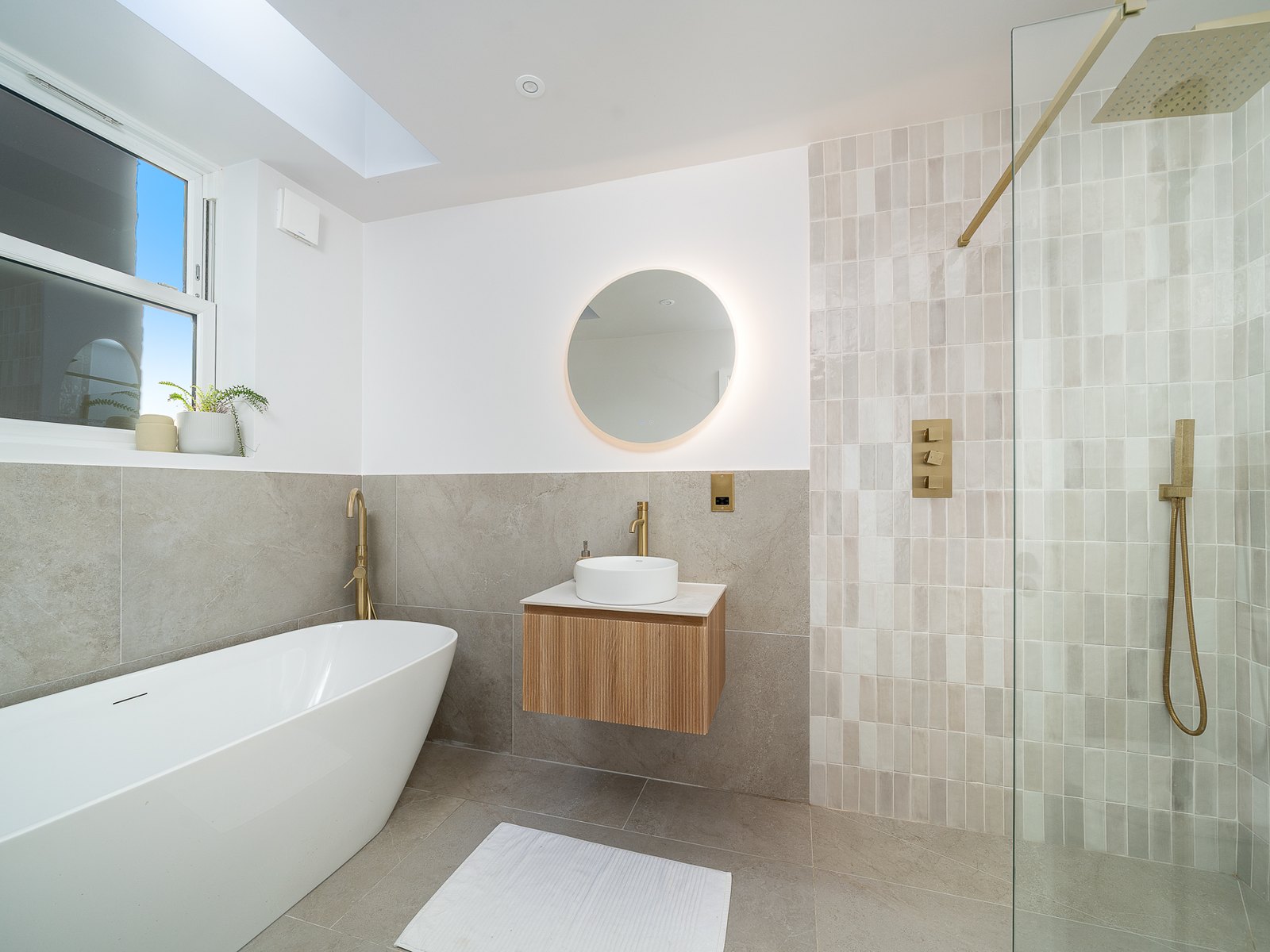 Finished. The en-suite, with the bath and the walk-in shower.